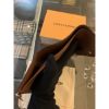 圖片 Louis Vuitton LV 經典老花設計 粉扣女生 扣子短夾