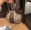 圖片 Gucci 574794 Ophidia GG帆布小牛皮球型手提包