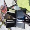 圖片 GUCCI GG logo壓紋8卡男短夾