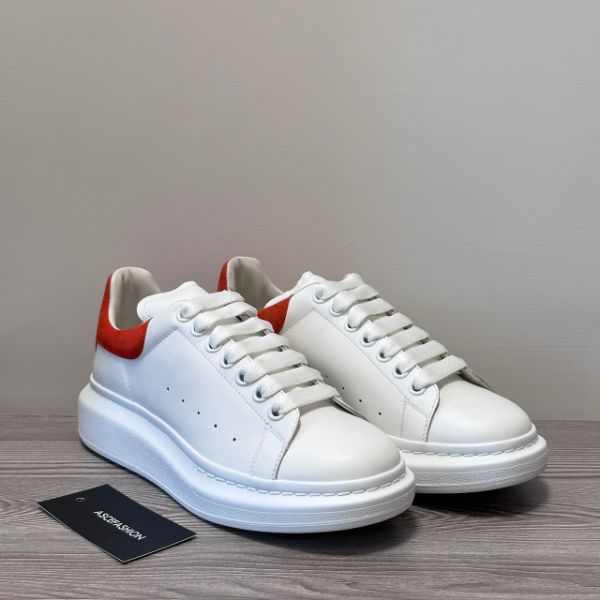 圖片 Alexander McQueen 橘紅尾小白鞋