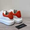 圖片 Alexander McQueen 橘紅尾小白鞋
