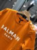 圖片  Balmain 女款鈕扣印花Logo徽標長版短T上衣  橙色  XS/S/M